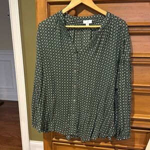 Green with a geometric floral all over design